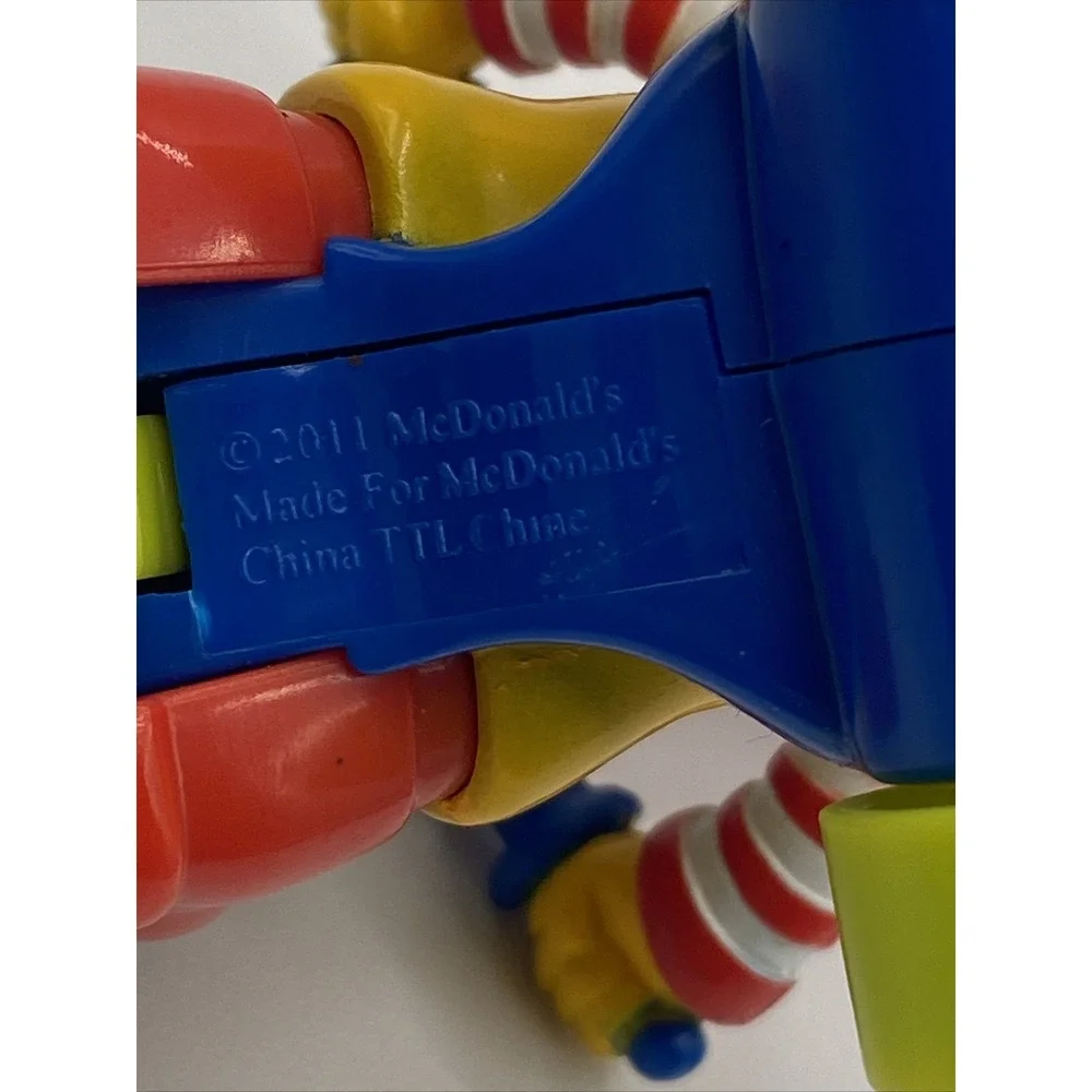 VTG McDonald's - Baby Ronald McDonald on Big Wheel - Fisher Price Happy Meal Toy